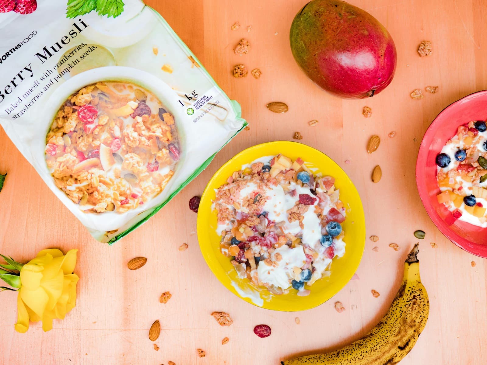 Colorful healthy breakfast bowls on a wooden table
